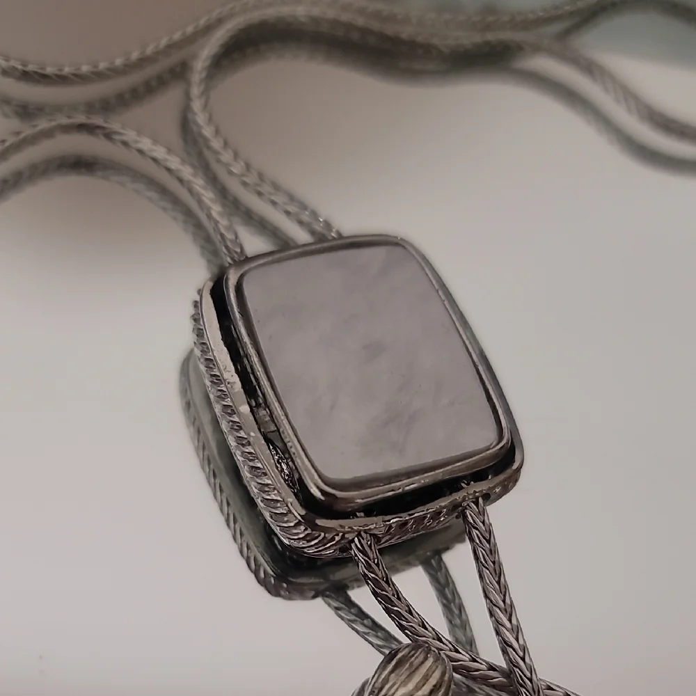 NWOT Silver Bolo Tie With Mother Of Perl Accent.